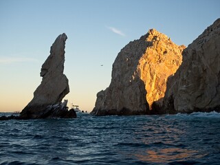 Fototapeta na wymiar Before reaching the Arch of Cabo San Lucas, there is a rock formation jutting out of the water that, if turned upside down, would resemble the shape of the peninsula of Baja California.