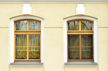 View of beautiful building with wooden windows