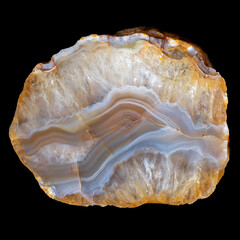 Yellow-blue layered agate with crystalline quartz isolated on a black background