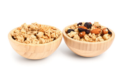 Bowls of tasty granola on white background