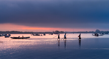 Dawn over Quang Loi Lagoon. Quang Loi commune, Quang Dien, Thua Thien - Hue, Vietnam belonging to the Tam Giang lagoon system, with an area 800 hectares © Quang