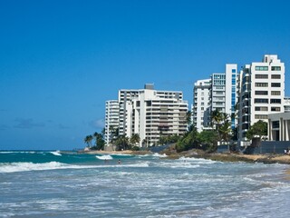 Beautiful (and strong) turquoise waves crash on the shores of Playa Condado (Condado Beach).  These waves were so strong I got knocked down several times and lost two pairs of sunglasses