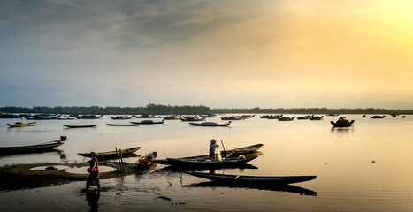 Dawn over Quang Loi Lagoon. Quang Loi commune, Quang Dien, Thua Thien - Hue, Vietnam belonging to...