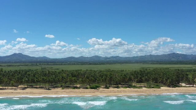Pristine and bounty shore. Arena Gorda beach with resorts. People faving fun on caribbean coastline. Aerial view from drone
