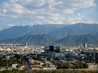 Obraz premium Ascending the Horno 3 in the Parque Fundidora (Foundry Park), which offers sweeping views of Monterrey and the towering mountains that surround the city, part of the Sierra Madre Oriental