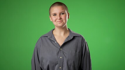 Smiling nod head YES pretty gender fluid non binary young woman 20s years old posing isolated on...