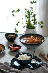 cooked rice with dishes on the table
