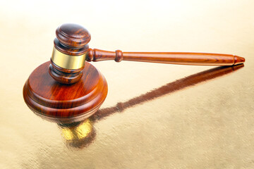 wooden hammer for auctions, bidding and judicial law. symbol of justice and verdict