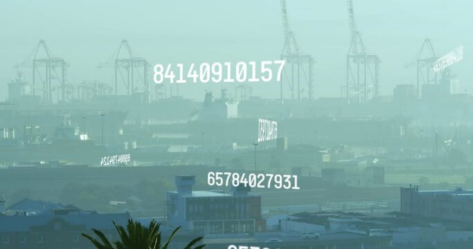 Animation of changing numbers and computer language over fog covered modern city