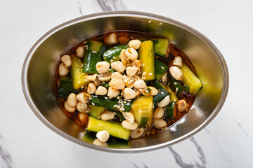 top view snack of cucumber with peanuts and sesame