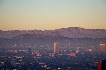 Mist rolls in from the Pacific Ocean into the Los Angeles Basin as evening falls