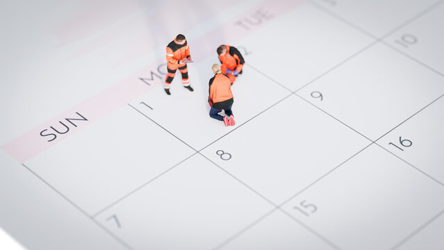 May 1st. Day 1 of month.  Miniature worker standing on Calendar. labor day's concept.