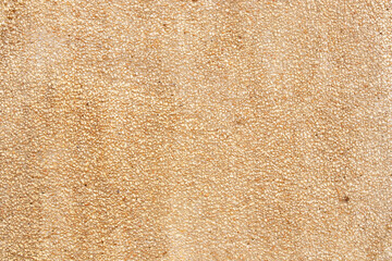 Abstract background or texture of pebbles small or gravel color yellow, orange attached with beautiful cement concrete. Natural pattern used to make wallpaper website along walls of houses, building.