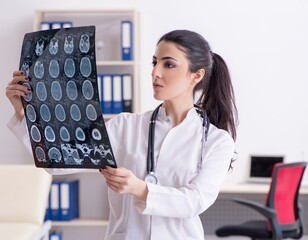 Young female doctor radiologist working in the clinic