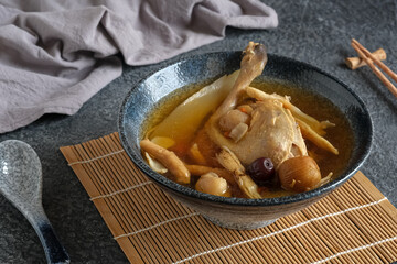 chicken chinese herbal soup in bowl
