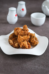 ayam goreng or crispy fried chicken with sesame seeds