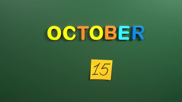 Hand sticking a sticker 15 October calendar day on school board. 15 date of October. Fifteenth day of October. 15th date number. 15 day calendar. Fifteen date. Handwashing, Hispanic Heritage