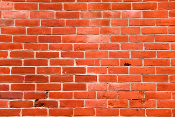 brick wall texture closeup showing exterior of building and closeup of brickwork architecture in urban masonry material with old and aged backdrop surface with dirty background brick for wall texture