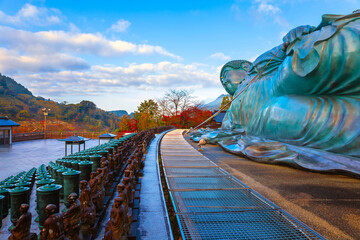 Fukuoka, Japan - Nov 21 2022: Nanzoin Temple in Fukuoka is home to a huge statue of the Reclining...