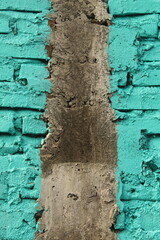 Tranquil-colored brick walls with vertical concrete lines are a modern and stylish design feature. The combination of warm and neutral tones creates a serene and calming atmosphere