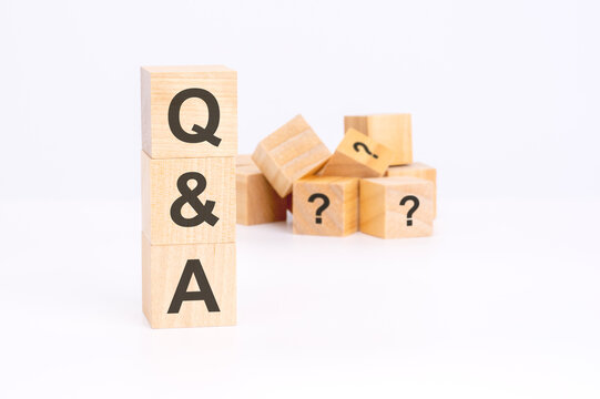 q and a text corporate income tax on wooden cubes, language concept