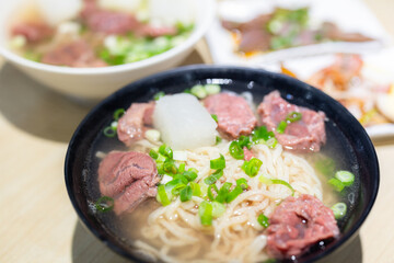 Soup dish with beef and noodles