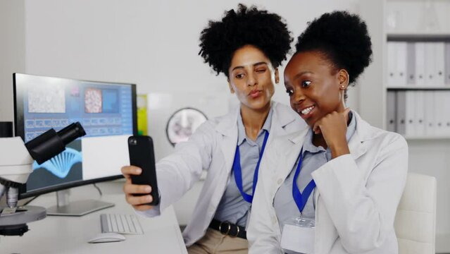 Scientist, women and peace sign selfie in lab for happy memory, social media or profile picture. Science, teamwork and funny medical doctors or friends laughing and taking photo with v hand emoji.
