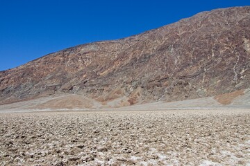 Badwater Basin, the lowest point in North America, sits in Death Valley in California. It is covered largely in salt flats from an ancient lake.