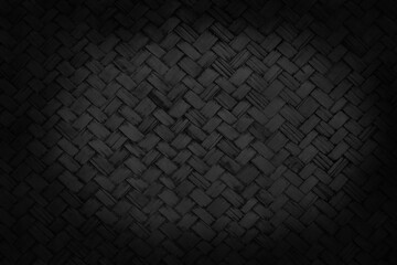 Old black bamboo weave texture background, pattern of woven rattan mat in vintage style.