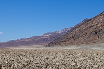 Badwater Basin, the lowest point in North America, sits in Death Valley in California. It is covered largely in salt flats from an ancient lake.