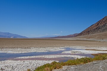 Badwater Basin, the lowest point in North America, sits in Death Valley in California. It is covered largely in salt flats from an ancient lake.