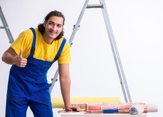 Young man contractor doing renovation at home