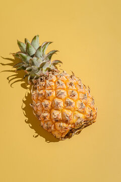 pineapple on a yellow background