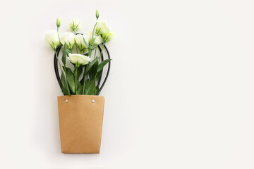 Top view image of delicate bouquet flowers over isolated white background