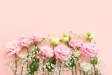 Top view image of delicate flower over pastel background