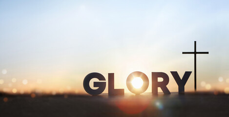 GLORY lettering with bright sunlight, the cross of Jesus Christ and praise, glory and prayer...