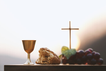 Holy Communion, which symbolizes the holy blood and flesh of Jesus Christ. The Last Supper. Bread,...