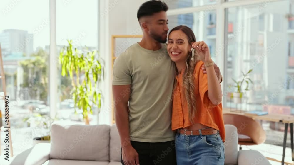 Poster Face, keys and couple moving into new house together, happy and excited for beginning in real estate. Portrait, love and man with woman embrace in living room, cheerful and smile in their home