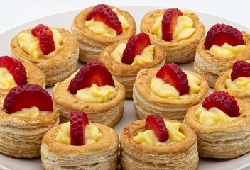 Sweet homemade Vol au vent filled with cream and strawberry