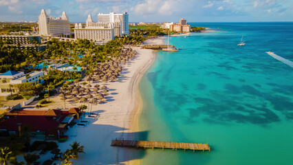 Palm Beach Aruba Caribbean, white long sandy beach with palm trees at Aruba Antilles