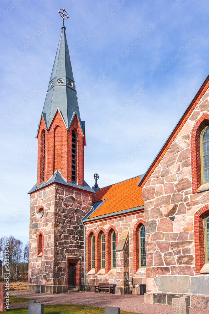 Wall mural Church tower built of stone in the country