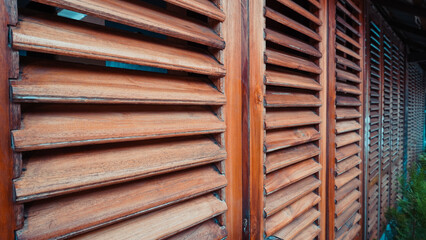 Discover the beauty of traditional wooden windows with excellent ventilation for your home or business