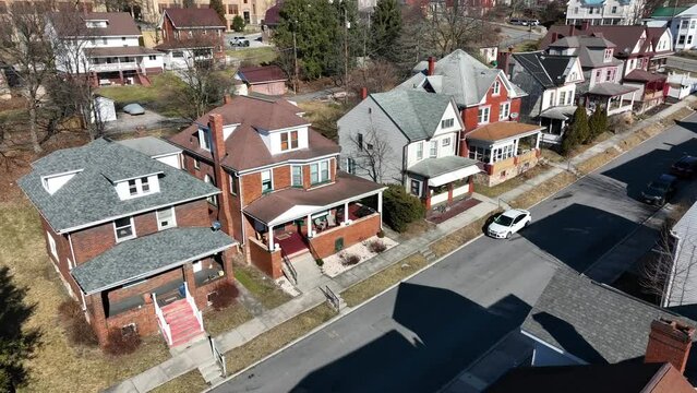 Aerial shot of houses in small town in America in winter.
