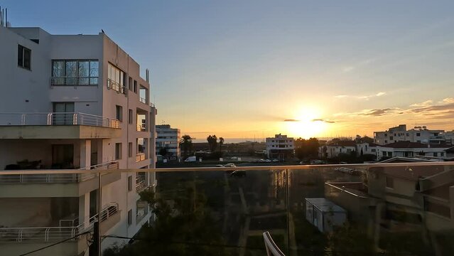A view from above of the sunrise over the Mediterranean Sea, from a hotel window in Larnaca, Cyprus