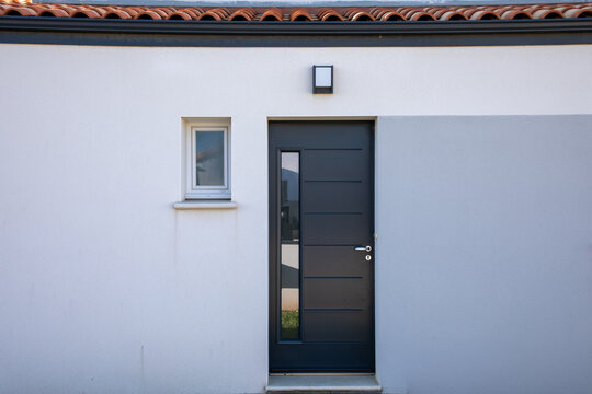 Modern White House With Grey Facade Door Of Suburb Home Entrance