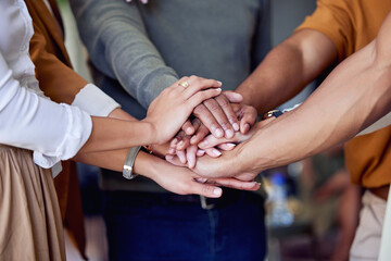 Business, hands and huddle for teamwork, support and team building at startup with diversity at...