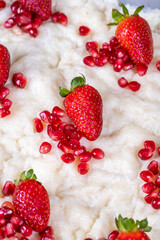 Gullac dessert. Traditional Ramadan dessert. Close-up of gullac dessert with pomegranate and strawberry