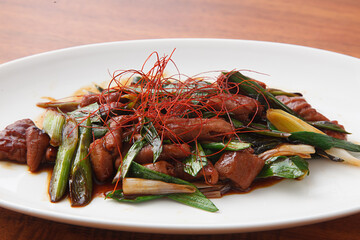 豚と葉ニンニクのもつ味噌炒め