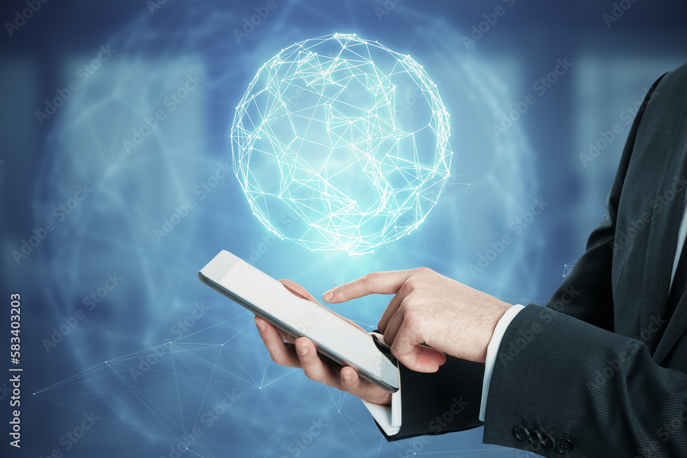 Poster Close up of male hand pointing at mobile phone with glowing polygonal globe hud on blurry background. Futuristic technology wireframe mesh polygonal element. Social Network Graphic Concept.