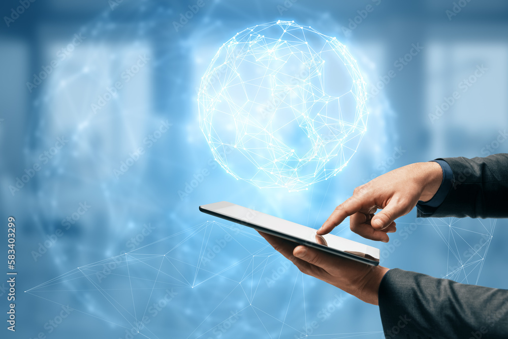 Poster close up of businessman hand pointing at mobile phone with glowing polygonal globe hud on blurry bac